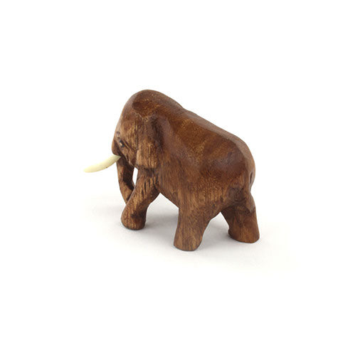Mini carved Raintree elephant, three-quarter rear view showing tail and hind legs, Thailand