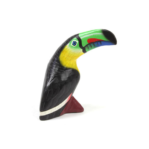 Painted wooden toucan carving, left side view, showing green and blue bill and yellow throat