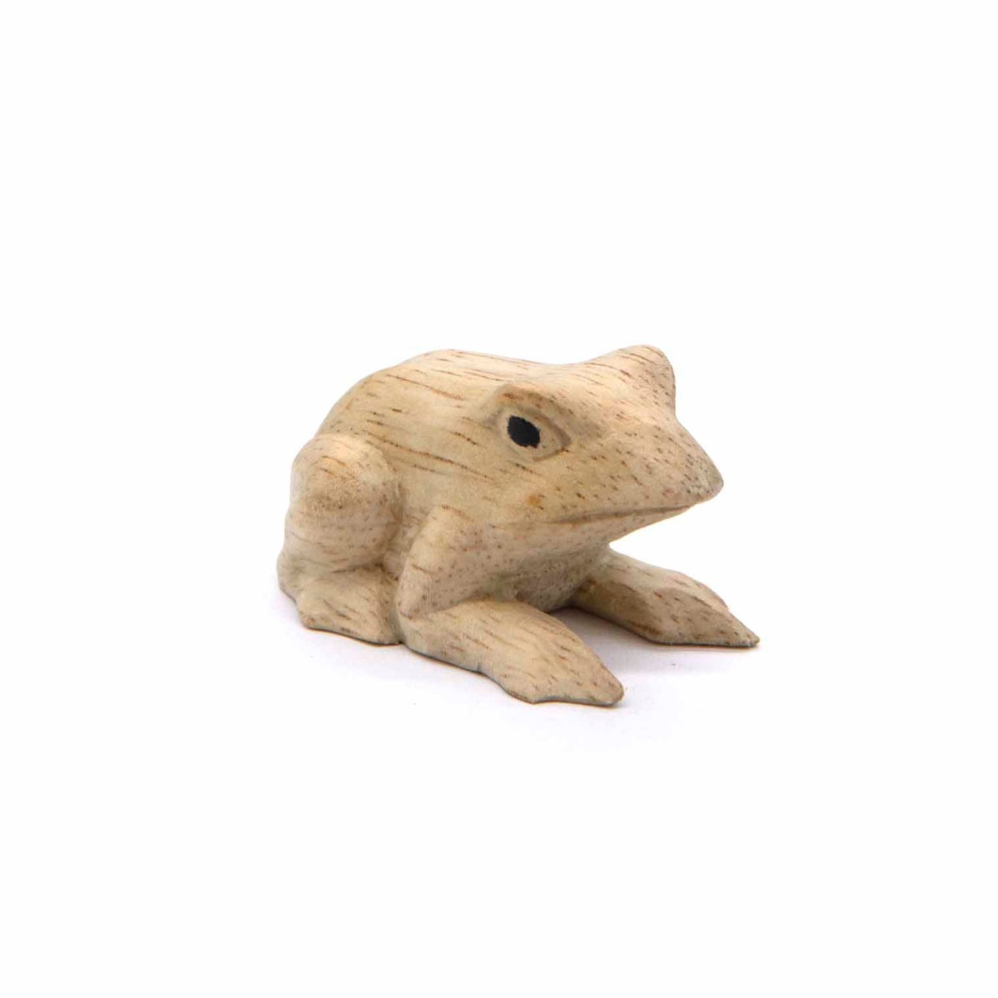 Small Indonesian wood frog carving, three-quarter side view showing compact low form