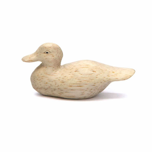 Hand-carved Albizia wood duck, head raised, side view showing natural grain, Indonesia