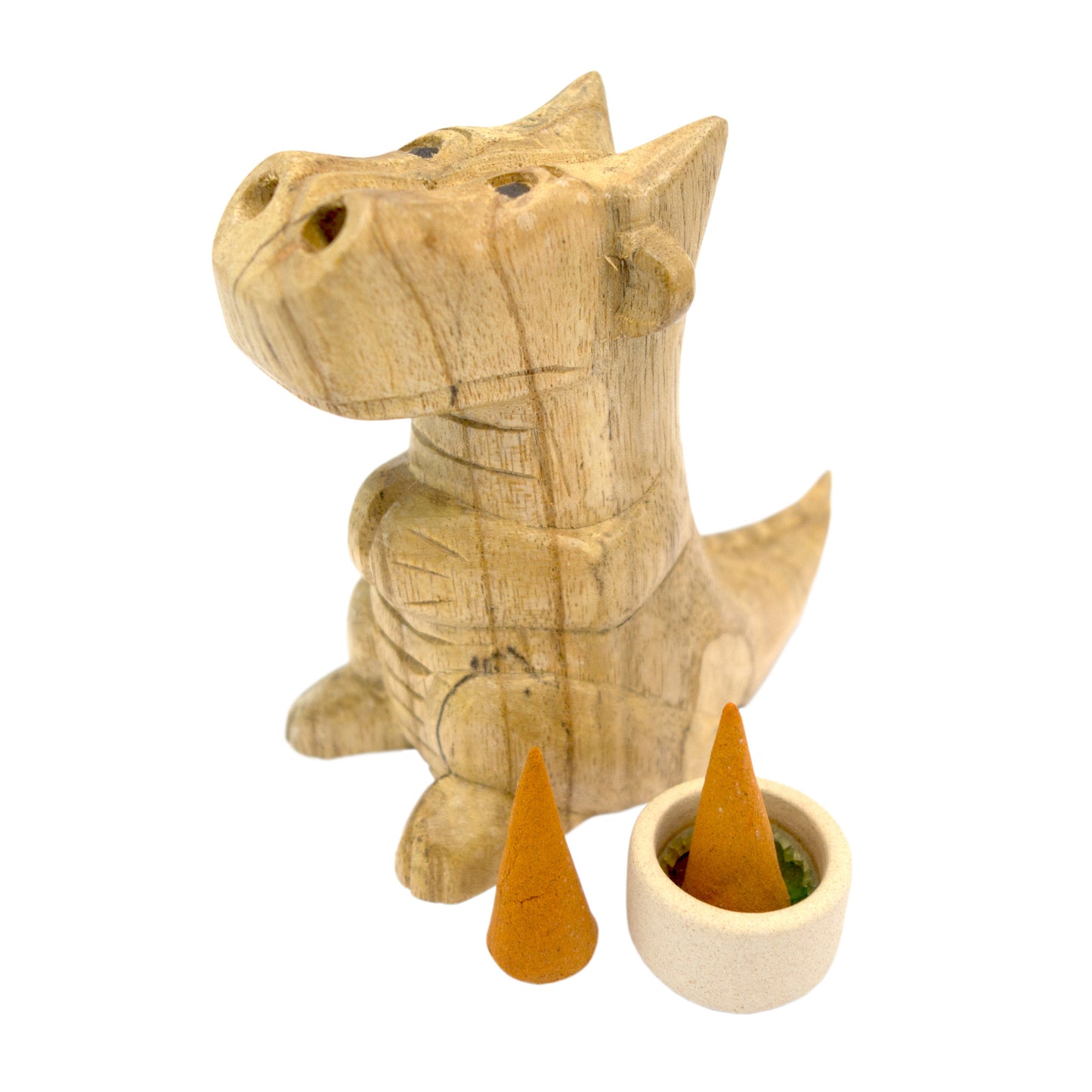 Small hand-carved wooden smoking dragon incense burner, a seated dragon with scaled back, clawed feet and curled tail, smoke channels carved through the nostrils