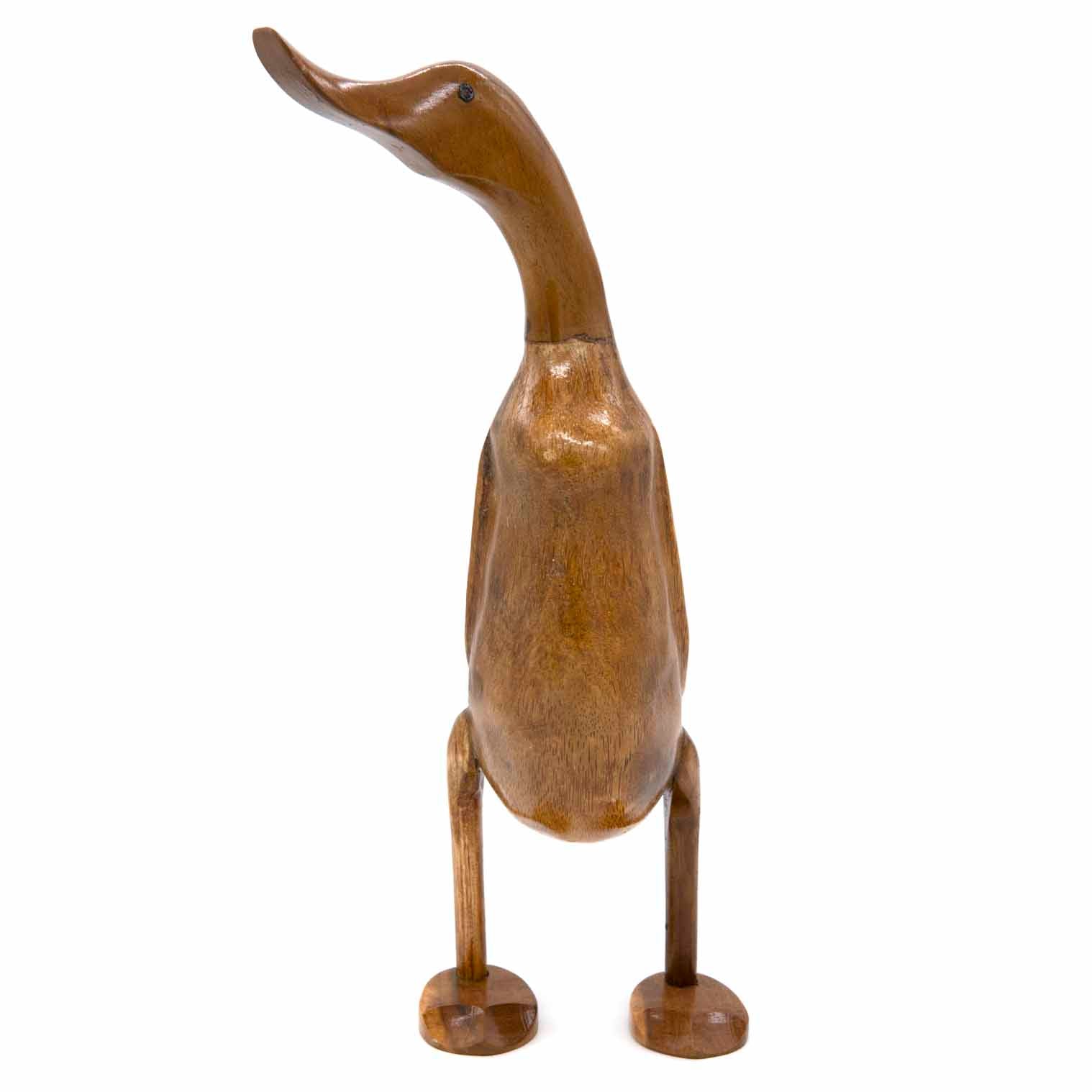 Bamboo root duck carving, front view showing long neck and flat feet, natural grain visible