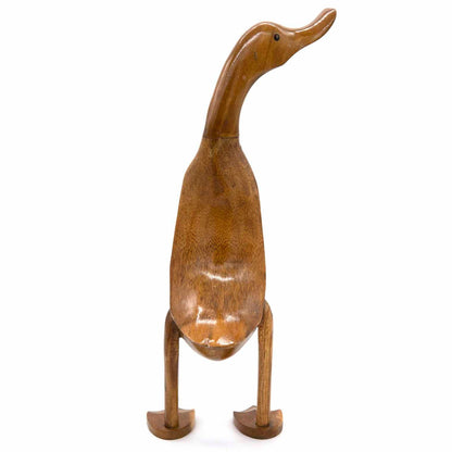 Bamboo root duck carving, front-on view showing smooth body and jointed legs