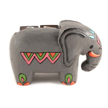 Reverse side of painted wooden elephant calendar showing folk chevron and leaf decoration, Indonesia