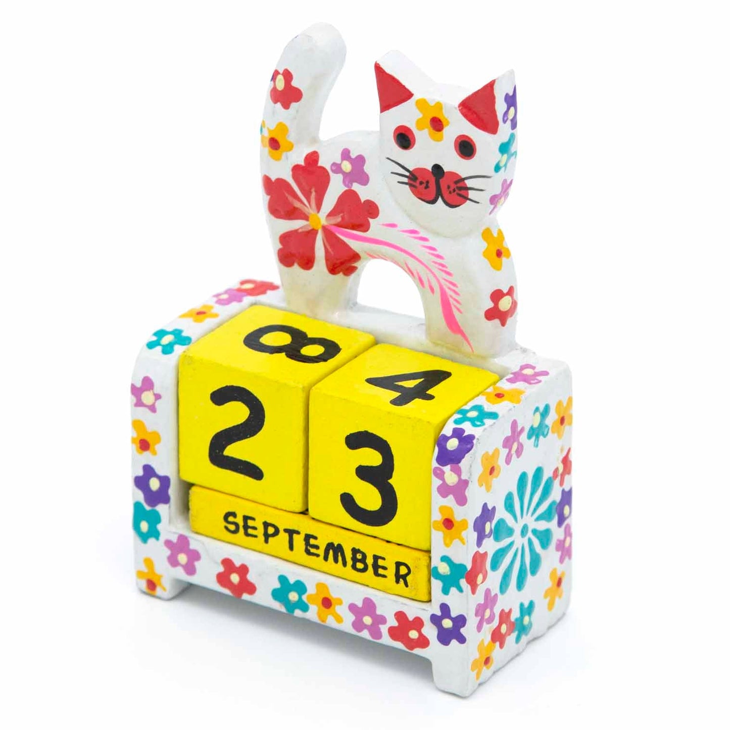 White painted wooden cat calendar with yellow date blocks showing September, front view on white