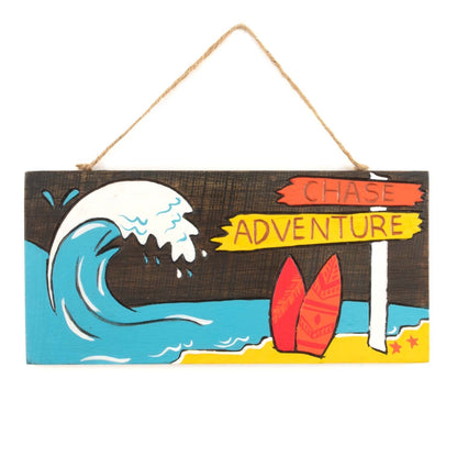 Front view of Chase Adventure wood plaque on white background, full detail of painted wave, surfboards and banner lettering