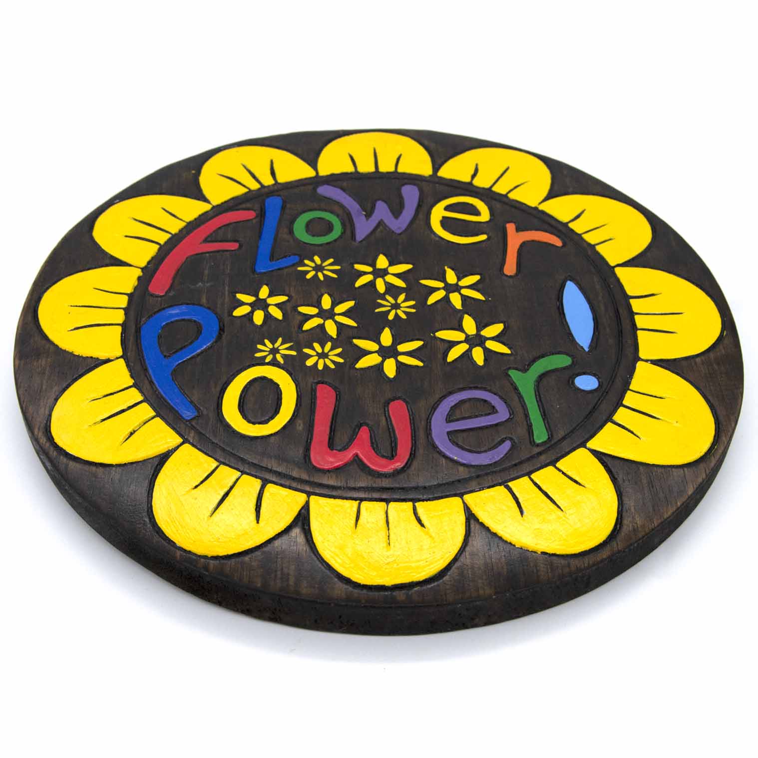 Angled side view of Flower Power round wood plaque showing disc depth and yellow-painted petal edge, Indonesia
