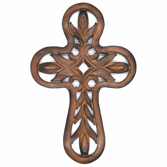 Front view of dark mango wood cross plaque with pierced leaf and scroll carving on white background