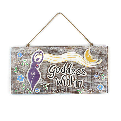 Front view of Goddess Within plaque on white background, showing twine hanger, purple goddess, flowing hair and floral vine b