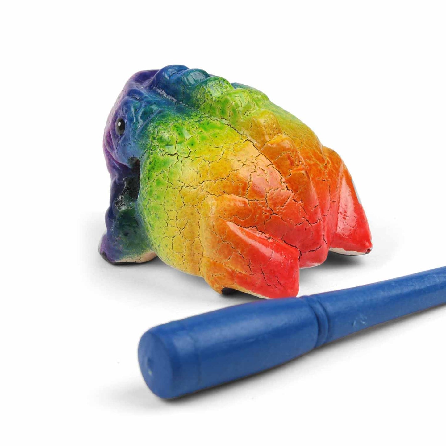 Mini rainbow frog guiro and blue striker laid separately on white background showing scale and crackle texture
