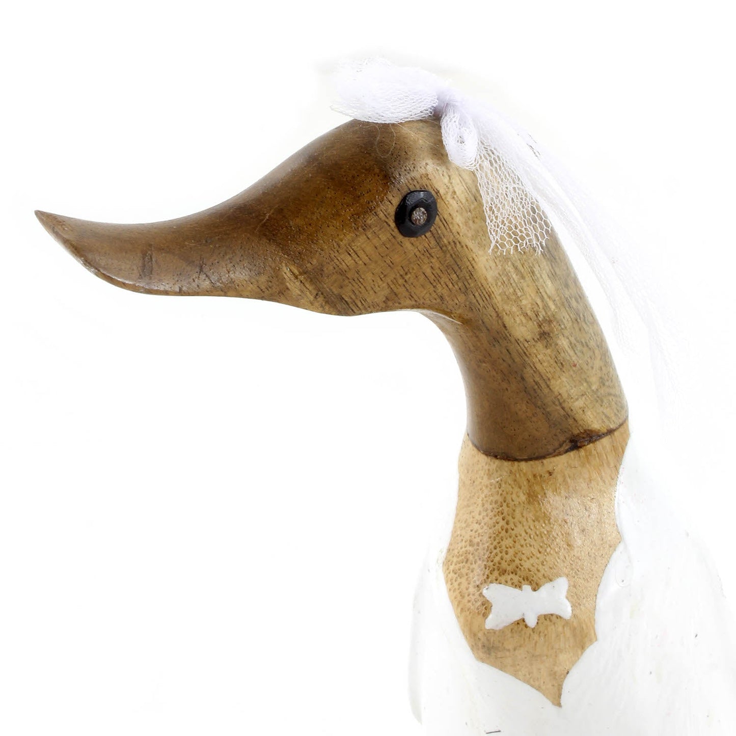 Close-up of bamboo root bride duck head and neck showing natural root grain, tulle veil and painted bow detail