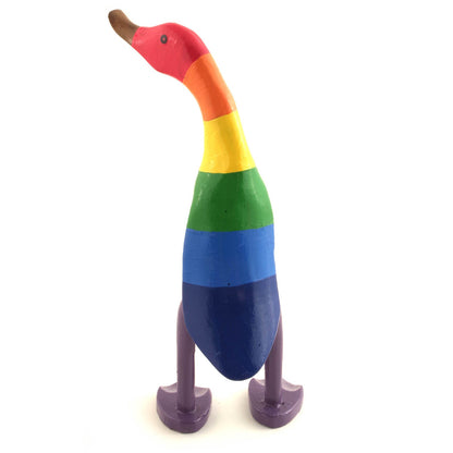 Rainbow bamboo root duck from behind on white background, showing violet legs and full stripe sequence