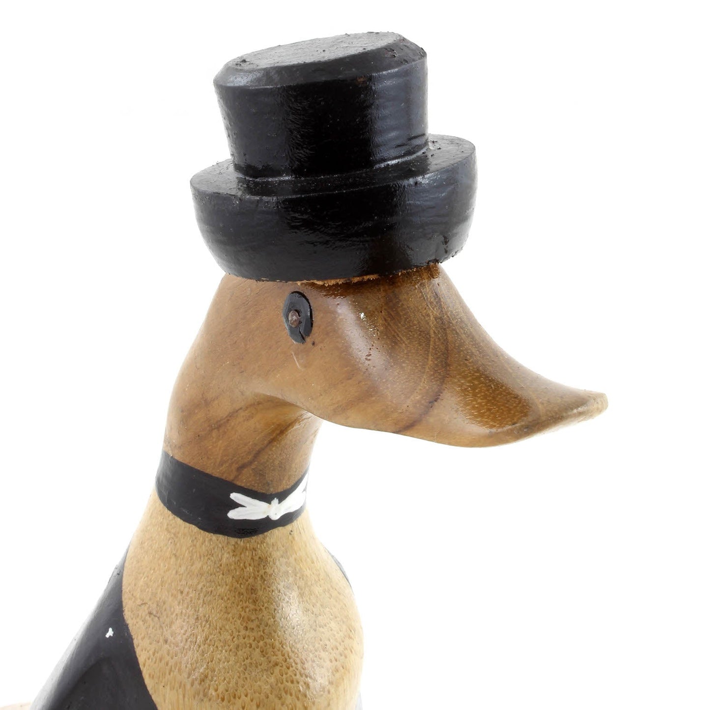 Close-up of bamboo root groom duck head showing carved top hat and painted bow tie detail, white background