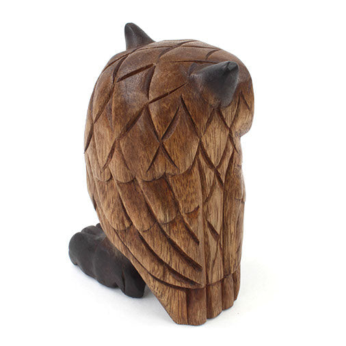 Rear three-quarter view of Rain Tree owl carving showing back feather pattern and tail