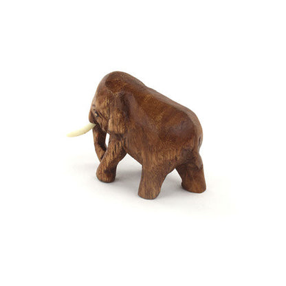 Mini carved Raintree elephant, three-quarter rear view showing tail and hind legs, Thailand