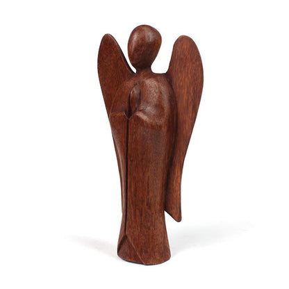 Side profile of large abstract wooden angel carving, Raintree wood, elongated form