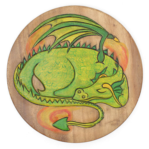 Top-down view of Raintree wood stool seat with carved sleeping green dragon surrounded by painted orange flame, Thailand