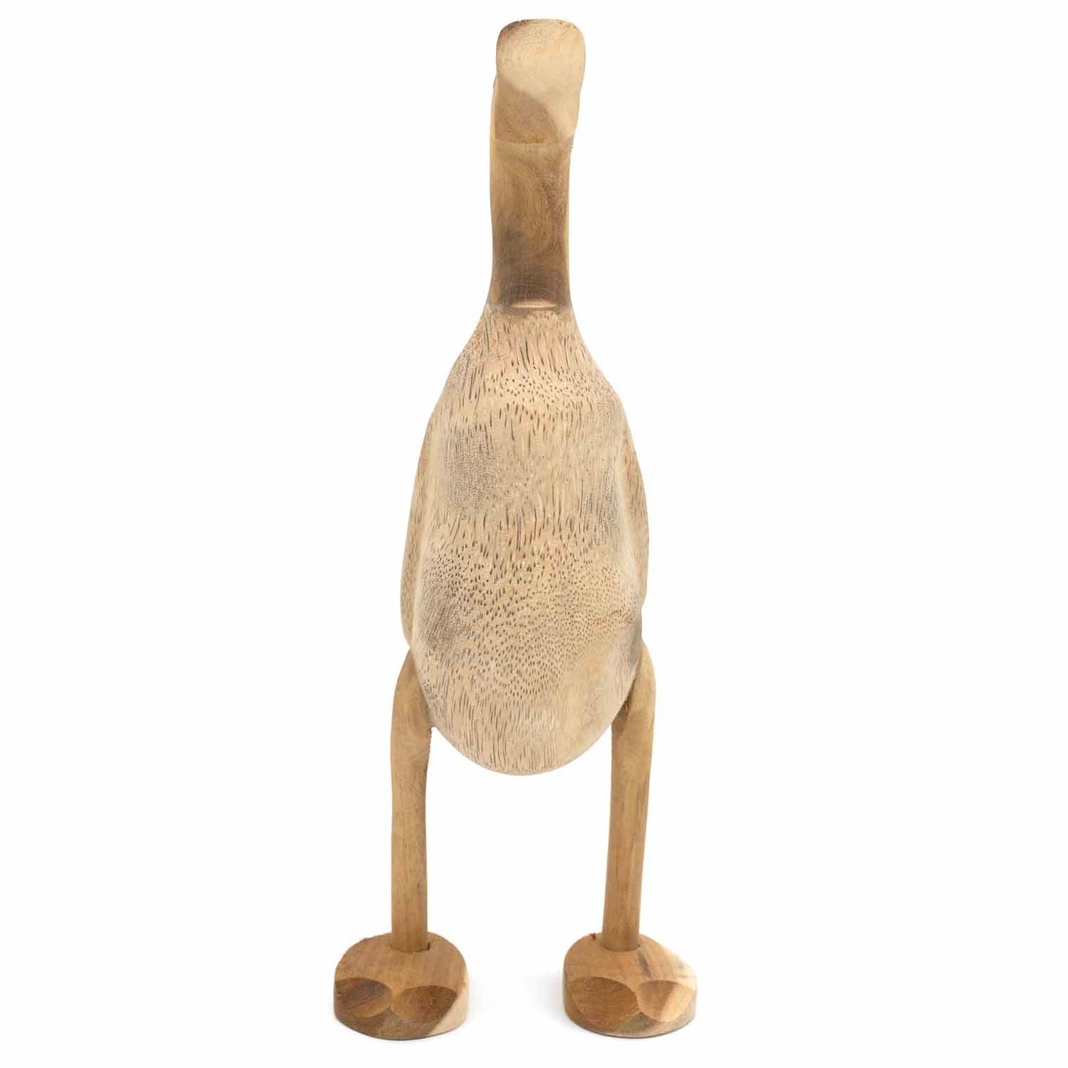 Bamboo root duck from behind, showing pale open grain across the body and carved feet, white background