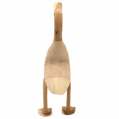 Unvarnished bamboo root duck, front-on view showing carved feet and full body grain pattern, white background