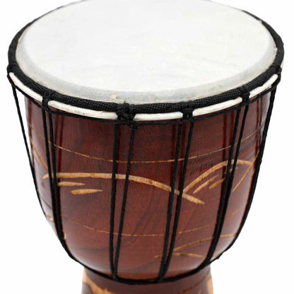 Close-up of goatskin head and black lacing on carved wood djembe drum, Indonesia