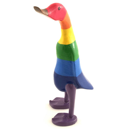 Rainbow bamboo root duck, opposite three-quarter view on white background showing blue and violet lower body