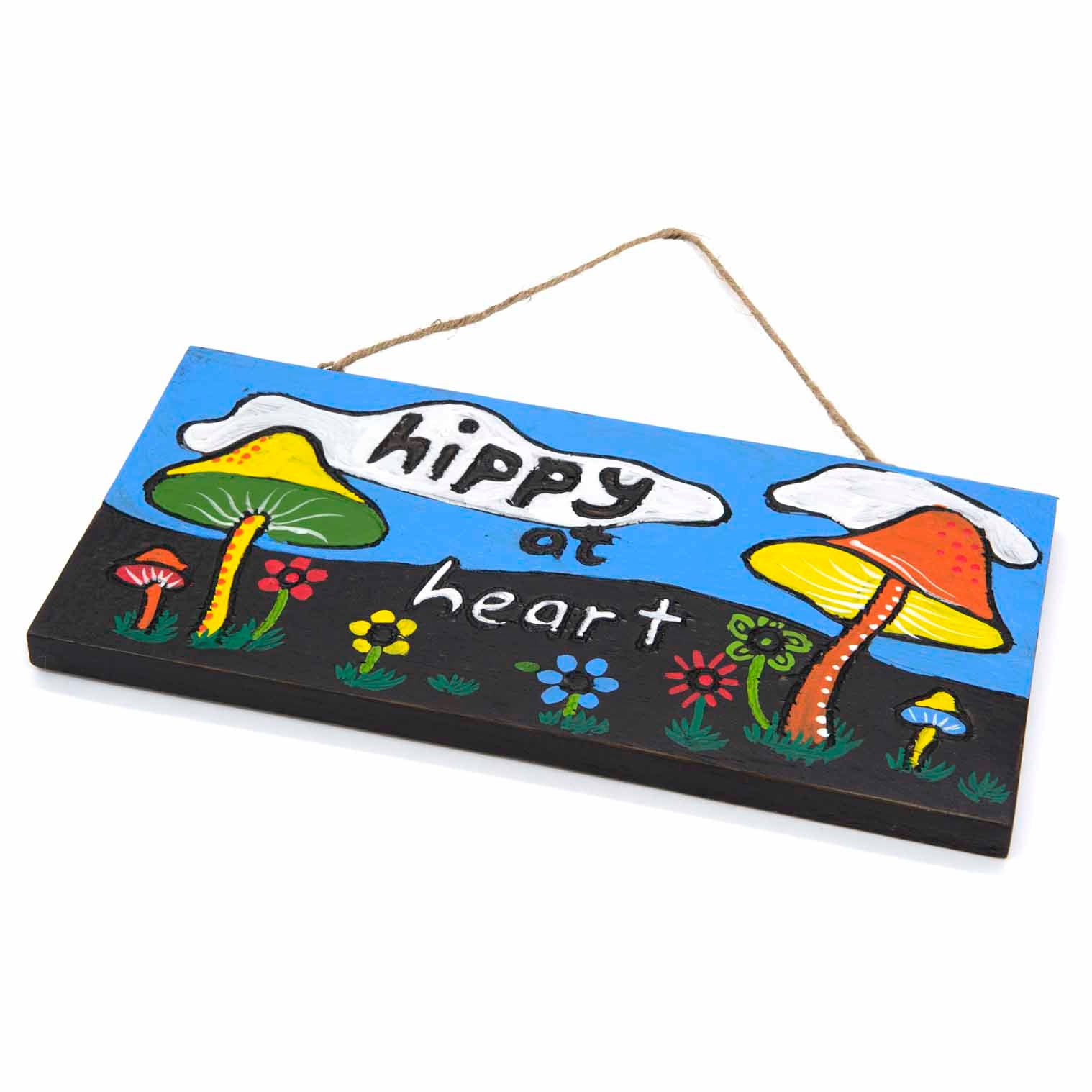 Second angled side view of Hippy at Heart plaque showing dark lower ground, flower scatter and carved wood edge