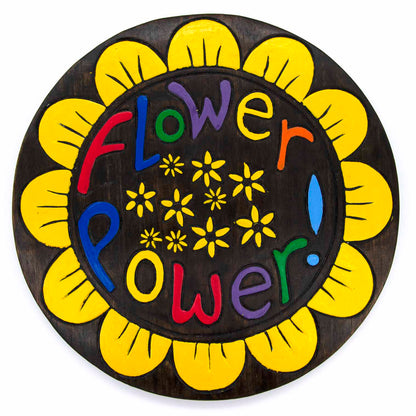 Front view of Flower Power painted wood disc on white background, yellow petal border and multicolour Flower Power lettering