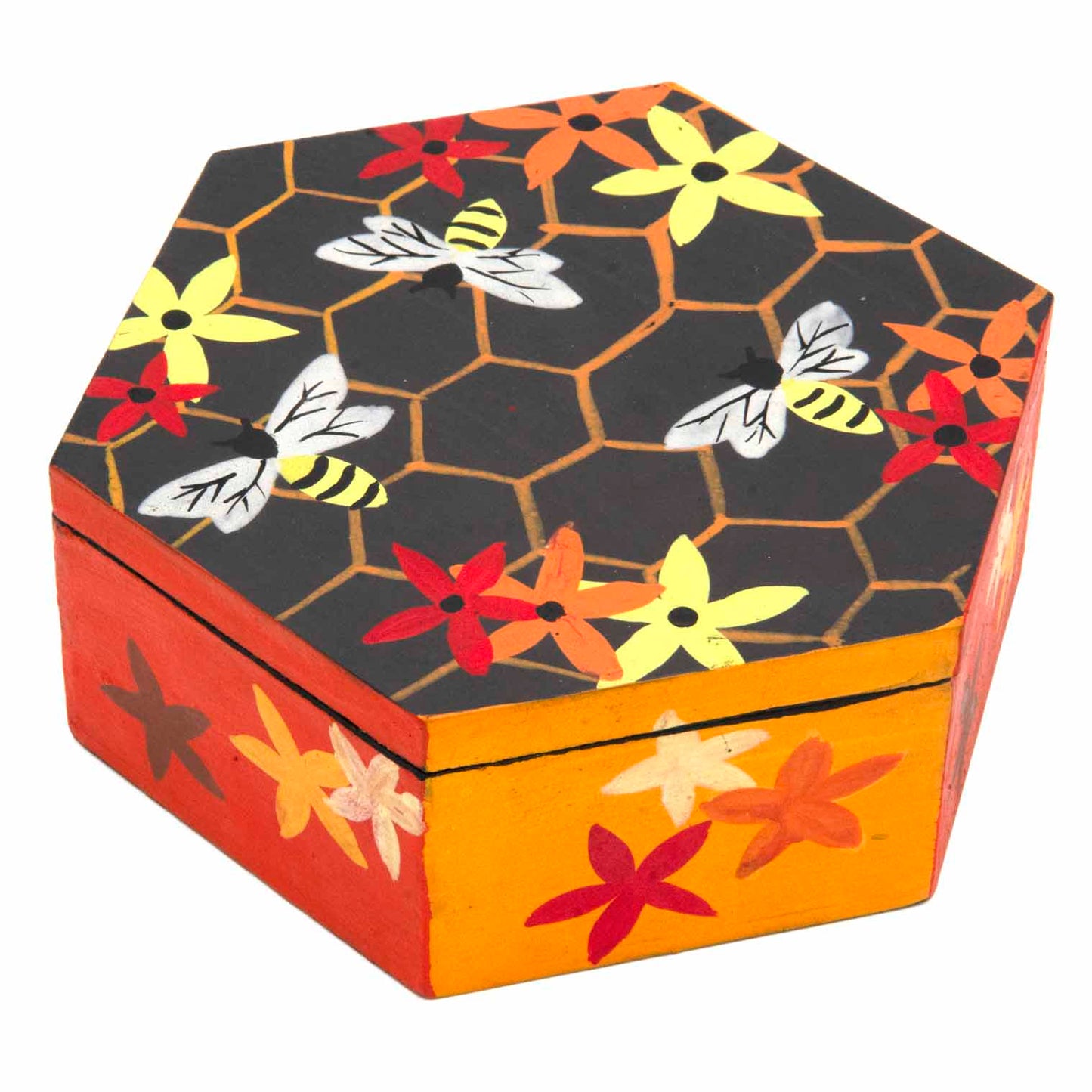 Hexagonal wooden bee box hand-painted with honeycomb, bees and flowers in charcoal, amber and red, three-quarter view