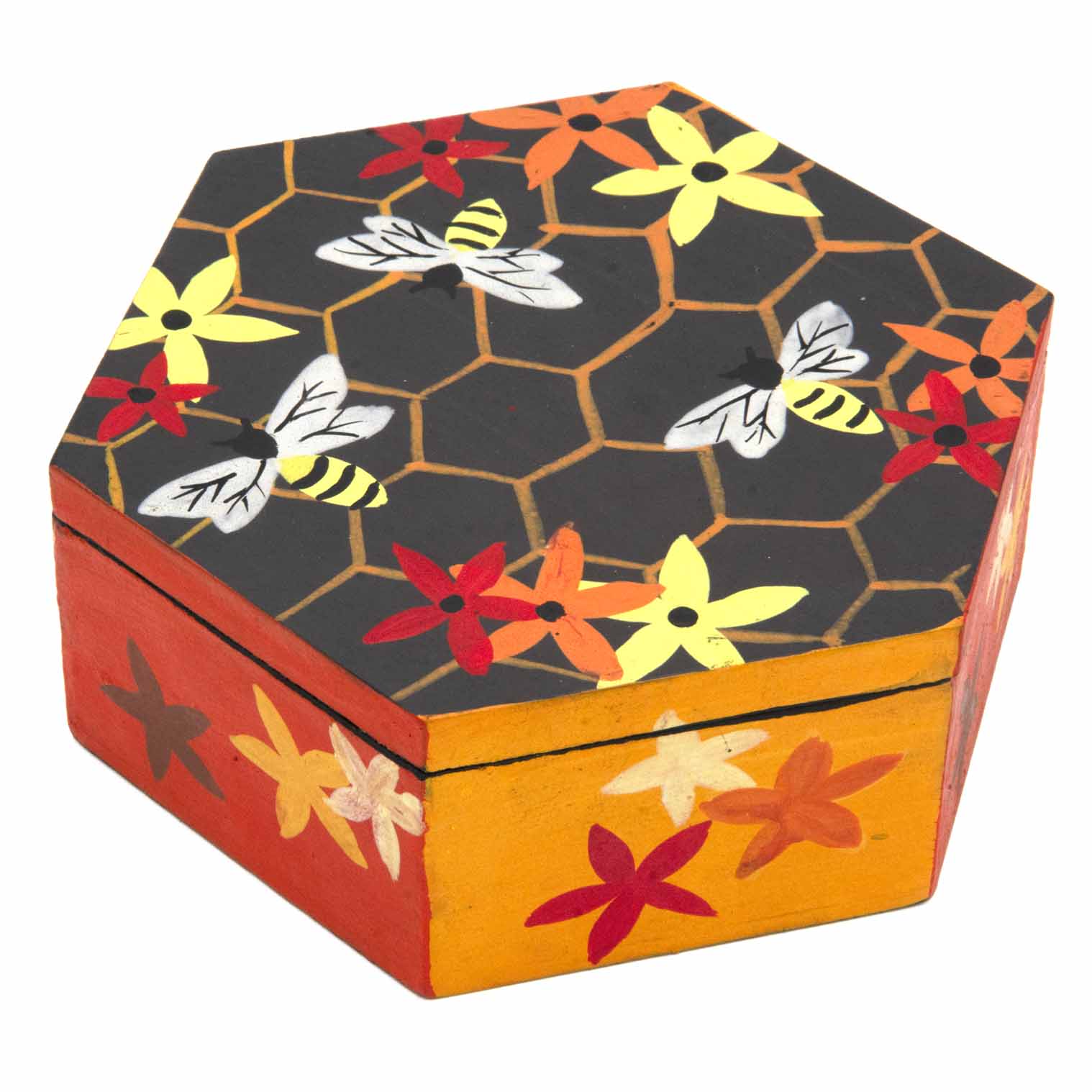 Hexagonal wooden bee box hand-painted with honeycomb, bees and flowers in charcoal, amber and red, three-quarter view