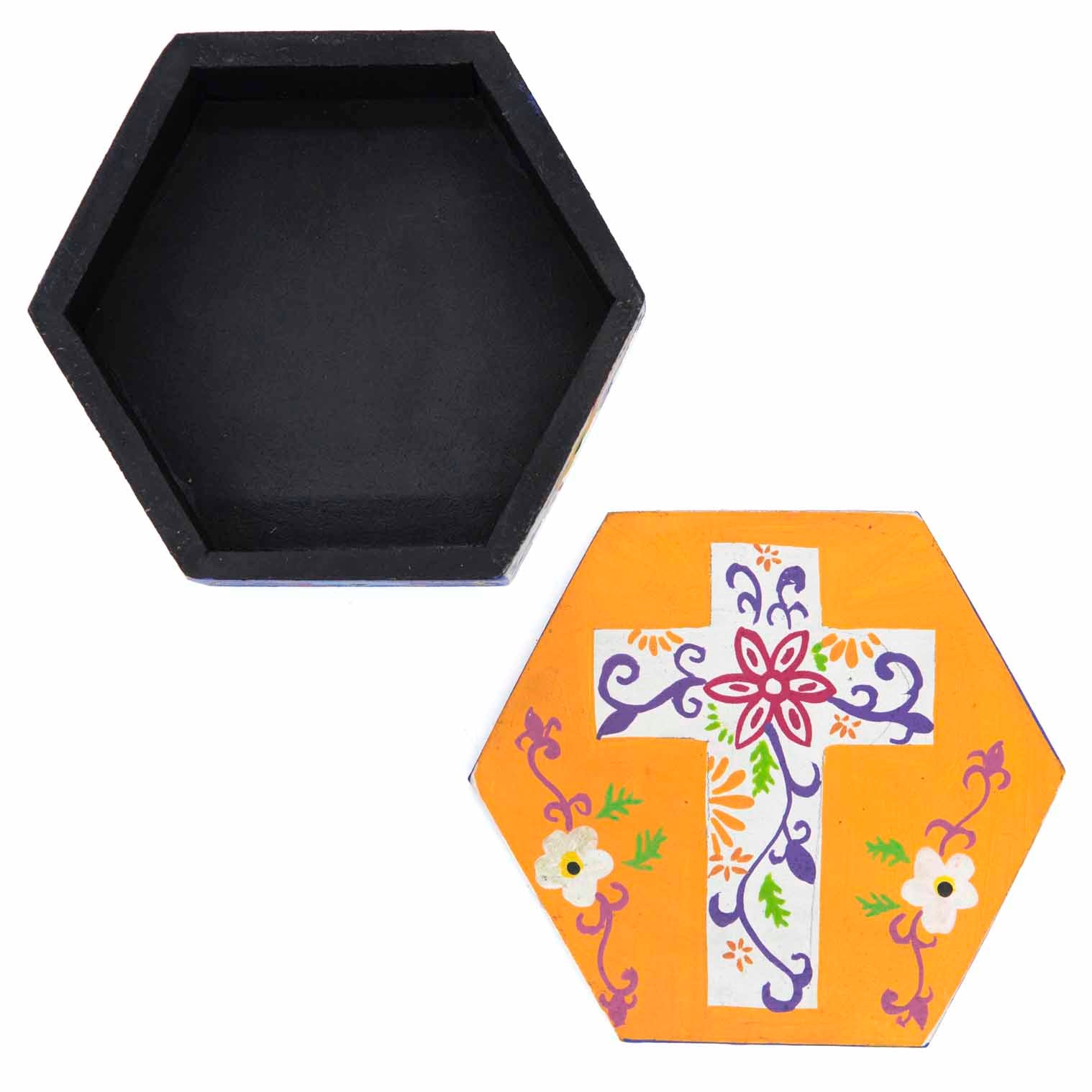 Top-down view of hexagonal cross box base and lid separated, showing full cross design on orange ground