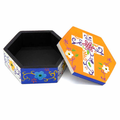 Hexagonal cross box with lid removed showing black interior and cross-painted lid, Indonesia