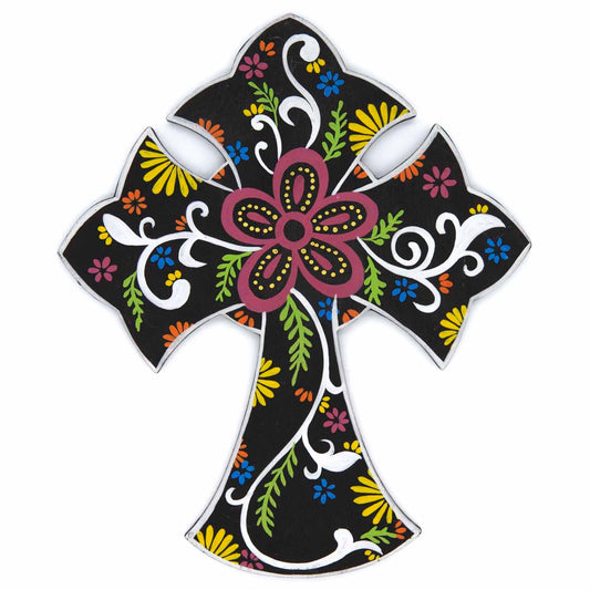 Front view of flared wood cross plaque, black ground with white scrollwork and central pink flower on white background