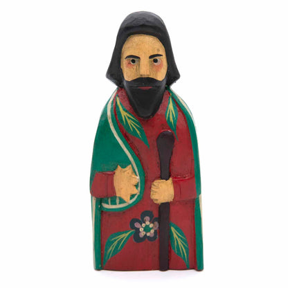 Carved wood Joseph figure, front view, green and red robe with staff and star motif, Indonesia, 15cm high