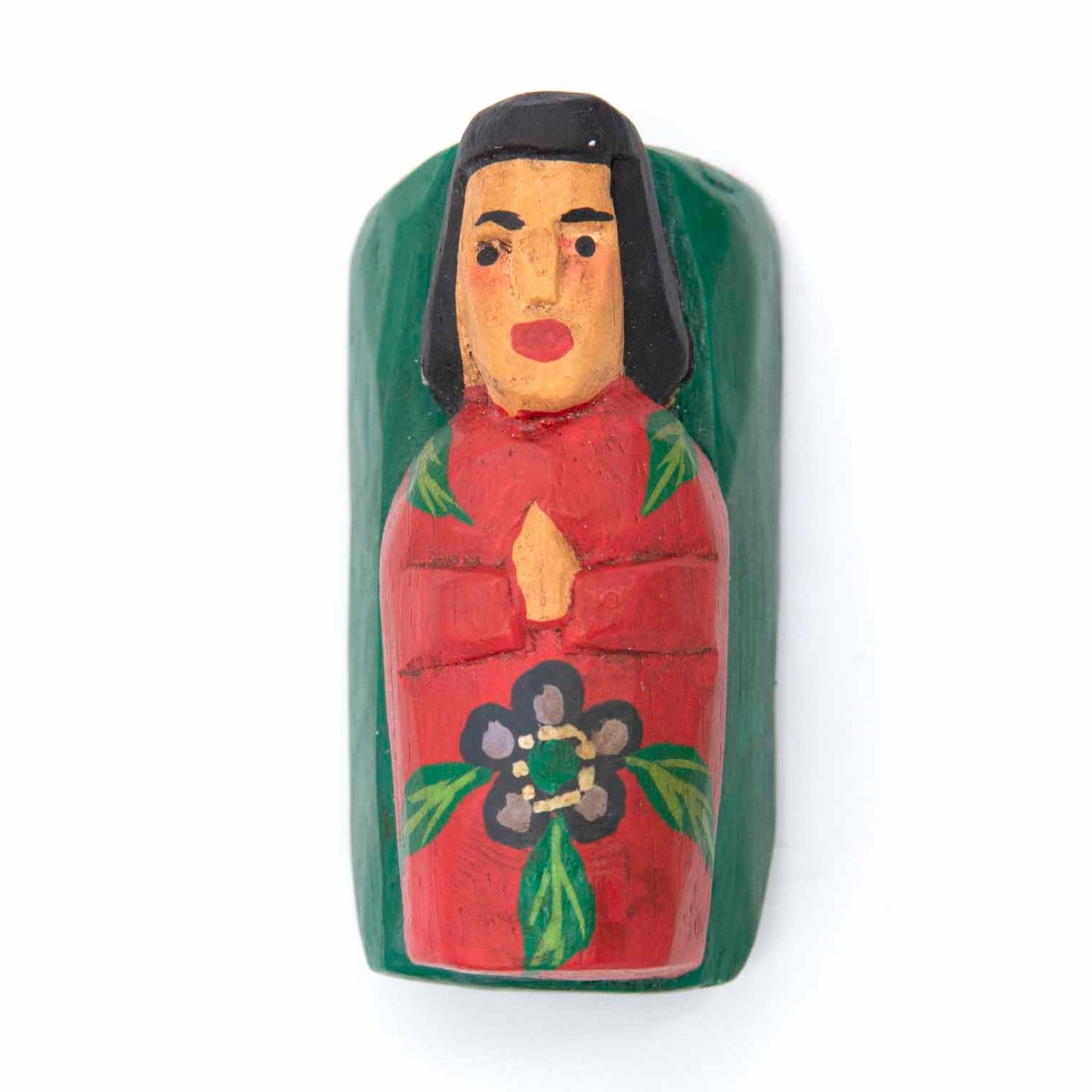 Carved wood baby Jesus figure, top view, red and green painted manger with flower detail, Indonesia