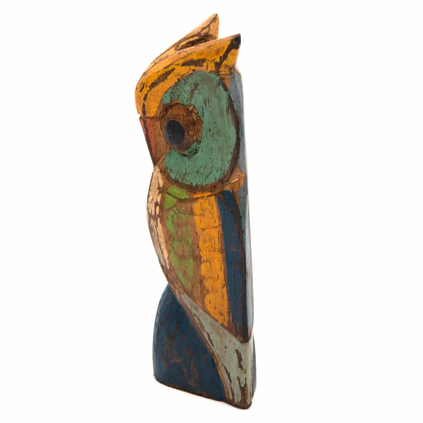 Rustic owl wood carving, side profile showing flat body and blue base, Indonesia