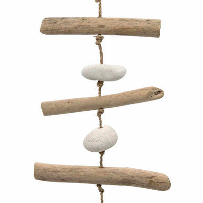 Detail of driftwood sticks and white pebbles on jute cord, seagull hanging upper section