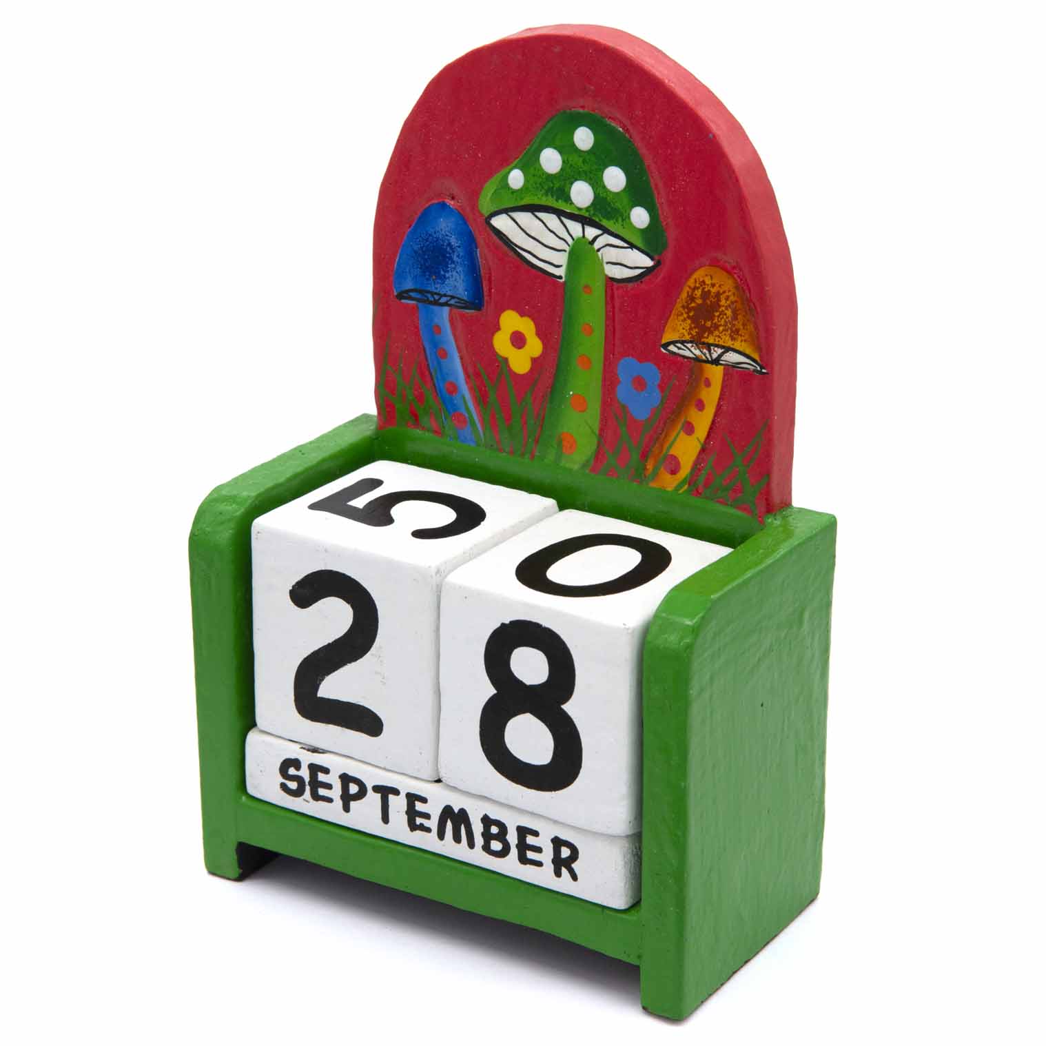 Three-quarter view of green wooden mushroom calendar showing white rotating date blocks, Indonesia