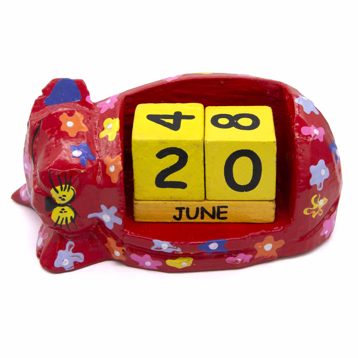Carved wooden sleeping cat calendar, front view showing yellow date blocks and June month bar