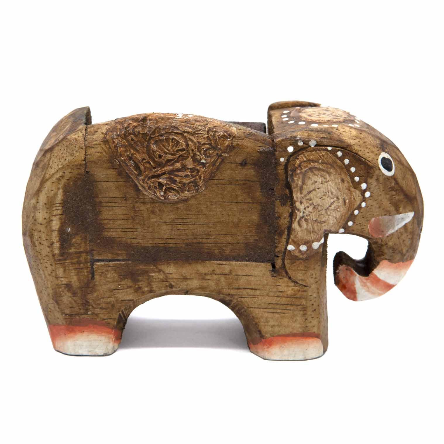 Side profile of small carved dark wood elephant calendar showing full body and block recess