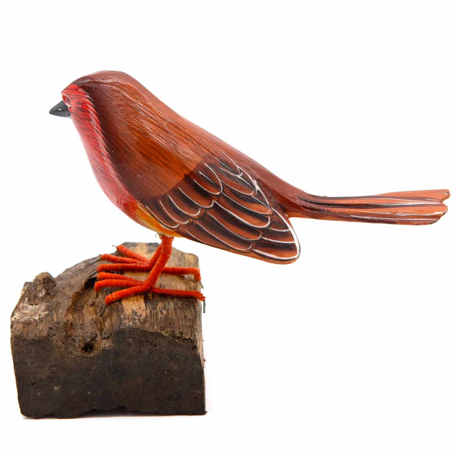 Carved robin on wood stand, side profile showing brown wing feather detail and wire feet