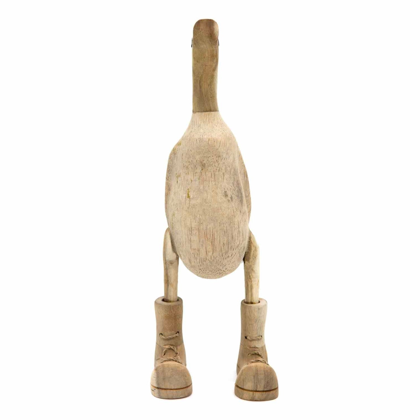 Rear view of natural bamboo root duck showing pale unvarnished body and carved boot detail, Indonesia