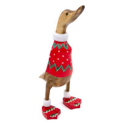 Three-quarter view of Christmas jumper bamboo duck showing red snowflake body and fur-trimmed slippers on white background