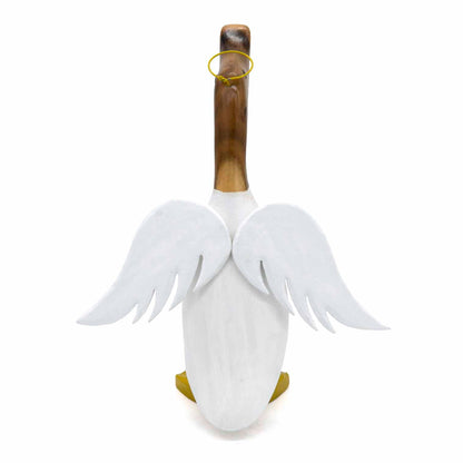 Rear view of angel bamboo root duck showing carved white wings spread from the body, gold feet, Indonesia