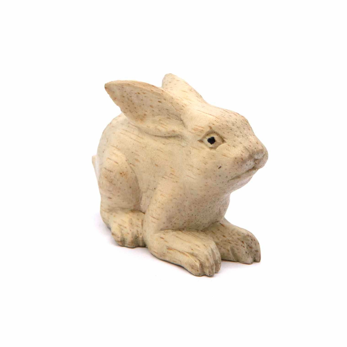 Small Indonesian wood rabbit carving, three-quarter view showing rounded body and ear detail