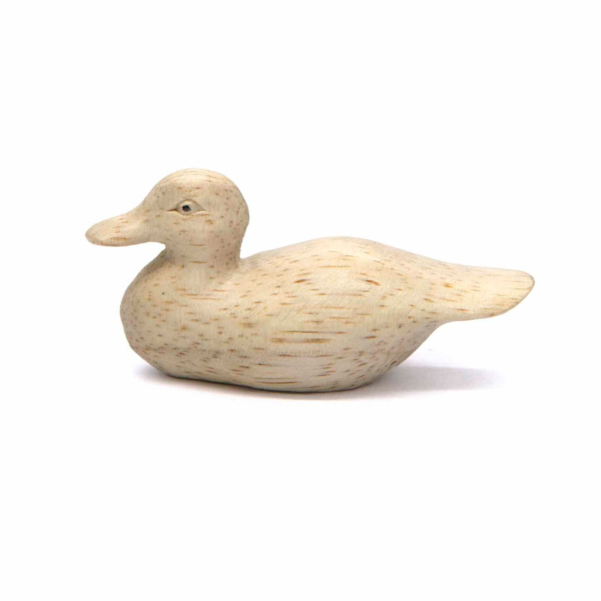 Hand-carved Albizia wood duck, head raised, side view showing natural grain, Indonesia