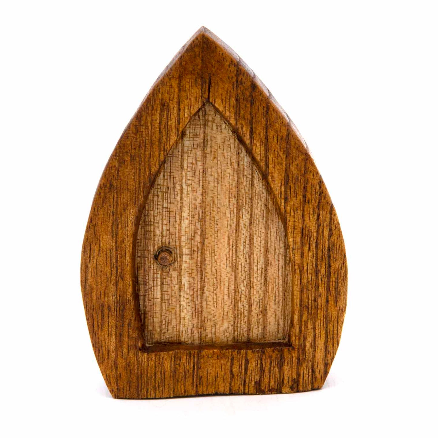 Wooden fairy door carving, front view showing pointed arch frame and vertical grain