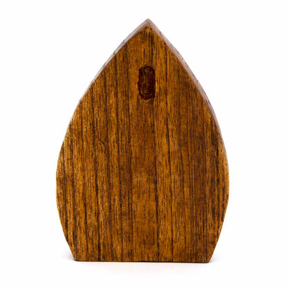 Fairy door wood carving, rear view showing flat back and warm amber stain, Indonesia