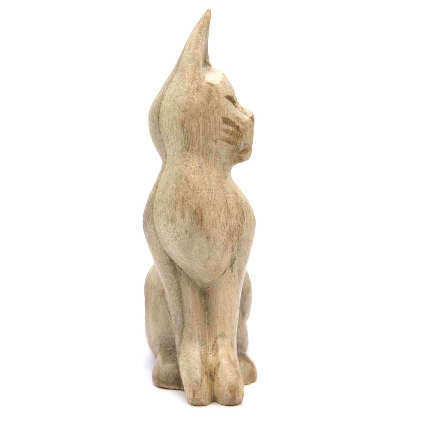 Carved pale wood cat, side view showing upright posture and bleached grain finish