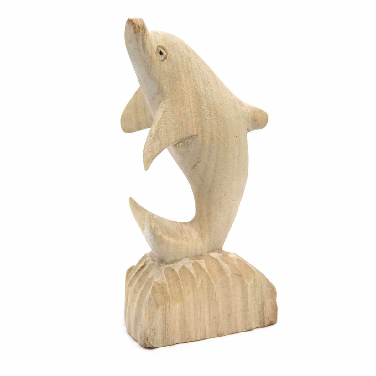 Pale wood dolphin carving arching from a carved wave base, three-quarter view, Indonesia