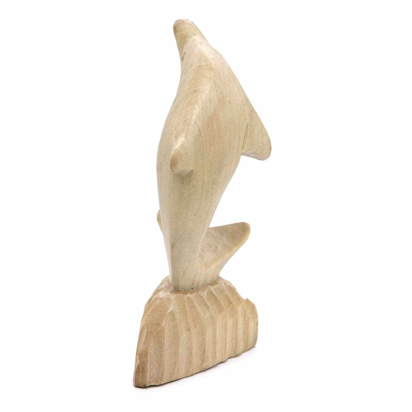 Carved pale wood dolphin, rear three-quarter view showing fin and tail detail